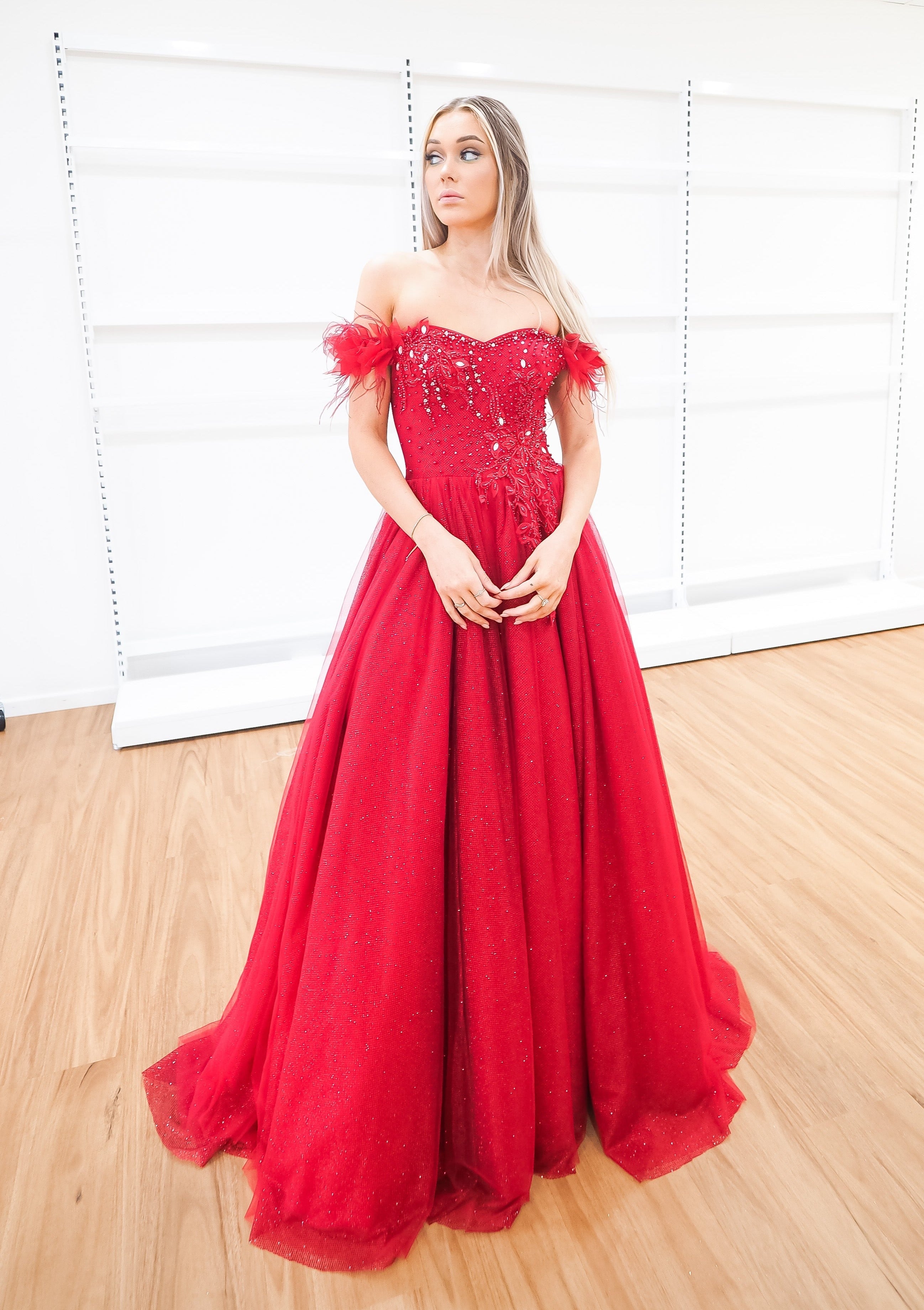 Dark red sparkling princess dress with off the shoulder feathers