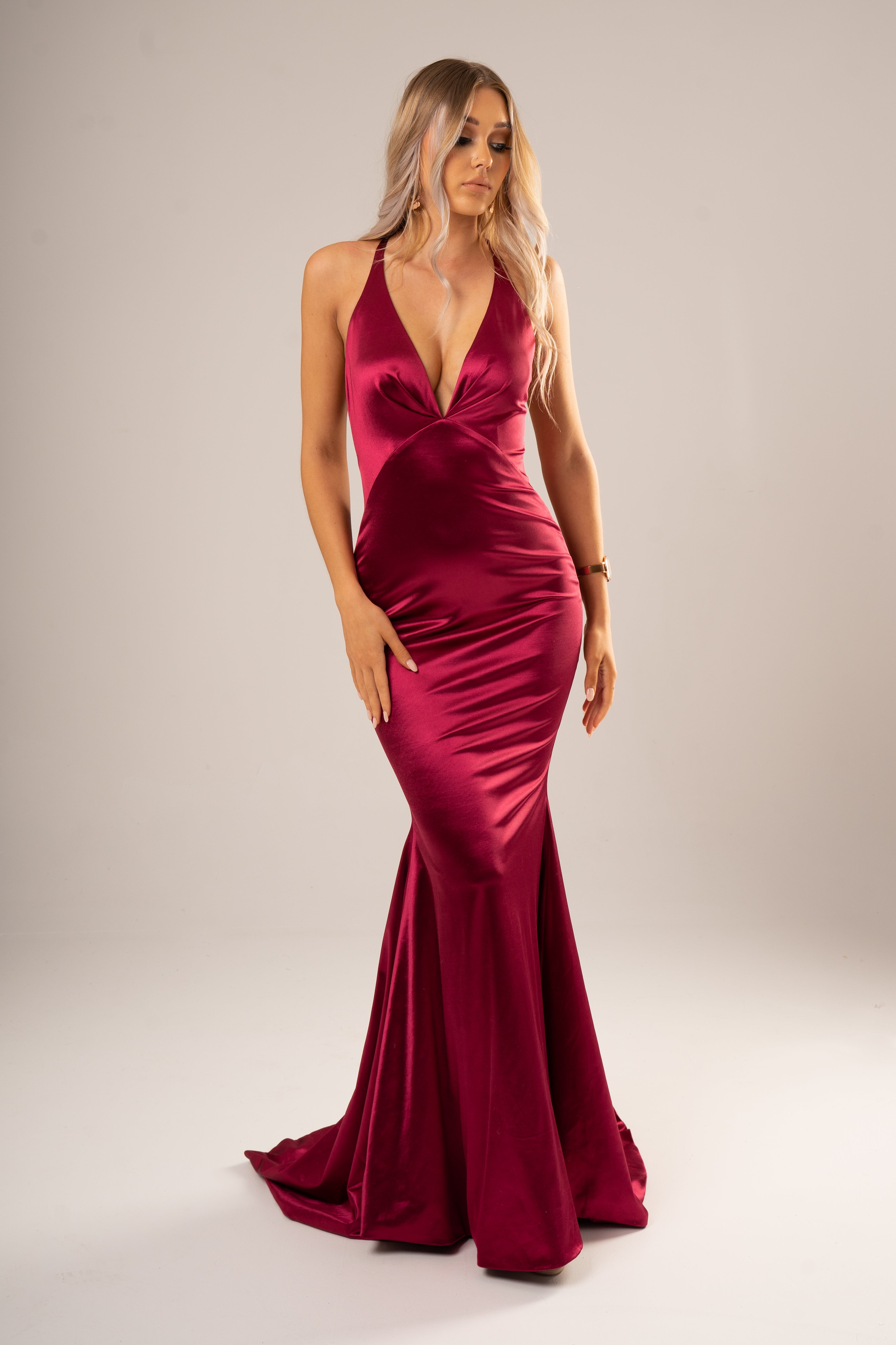 Red wine satin dress with deep v neckline for hire