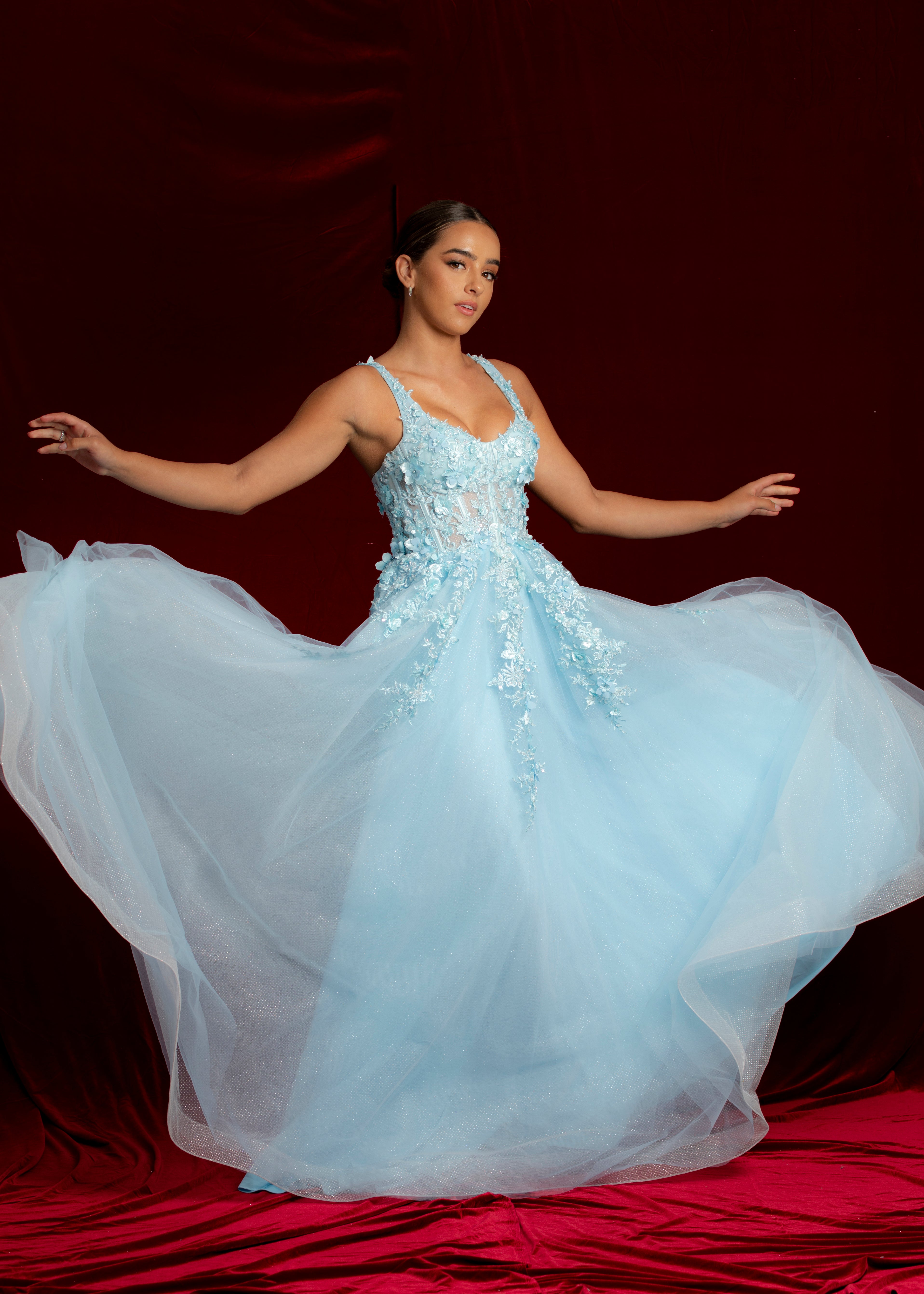 Sparkling blue princess dress with square bustier top with straps fore Hire