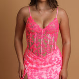 Sparkling pink dress with V neckline and corset back