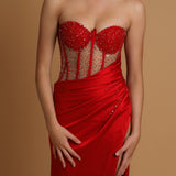 Red corset dress with high slit