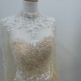 Nude Full length sleeve sample gown with pearl beading and white lace