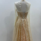 Nude Full length sleeve sample gown with pearl beading and white lace