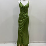 Sage green ruched sample gown with split and spaghetti straps