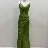 Sage green ruched sample gown with split and spaghetti straps