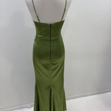 Sage green ruched sample gown with split and spaghetti straps