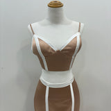 Two piece dusty pink with vertical white line top and mermaid skirt with spilt sample