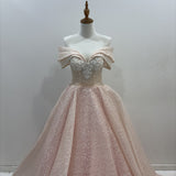 Baby pink off the shoulder ballgown with sequin, lace, and pearl beading