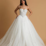 White sparkling corset princess dress with Basque waist for hire