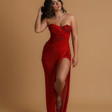 Red satin column shaped dress with high slit