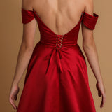 Red satin dress with off the shoulder and high slit