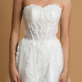 Strapless corset wedding dress with flower details for hire