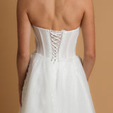 Strapless corset wedding dress with flower details for hire