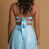 blue accent straight neck line with flowy skirt