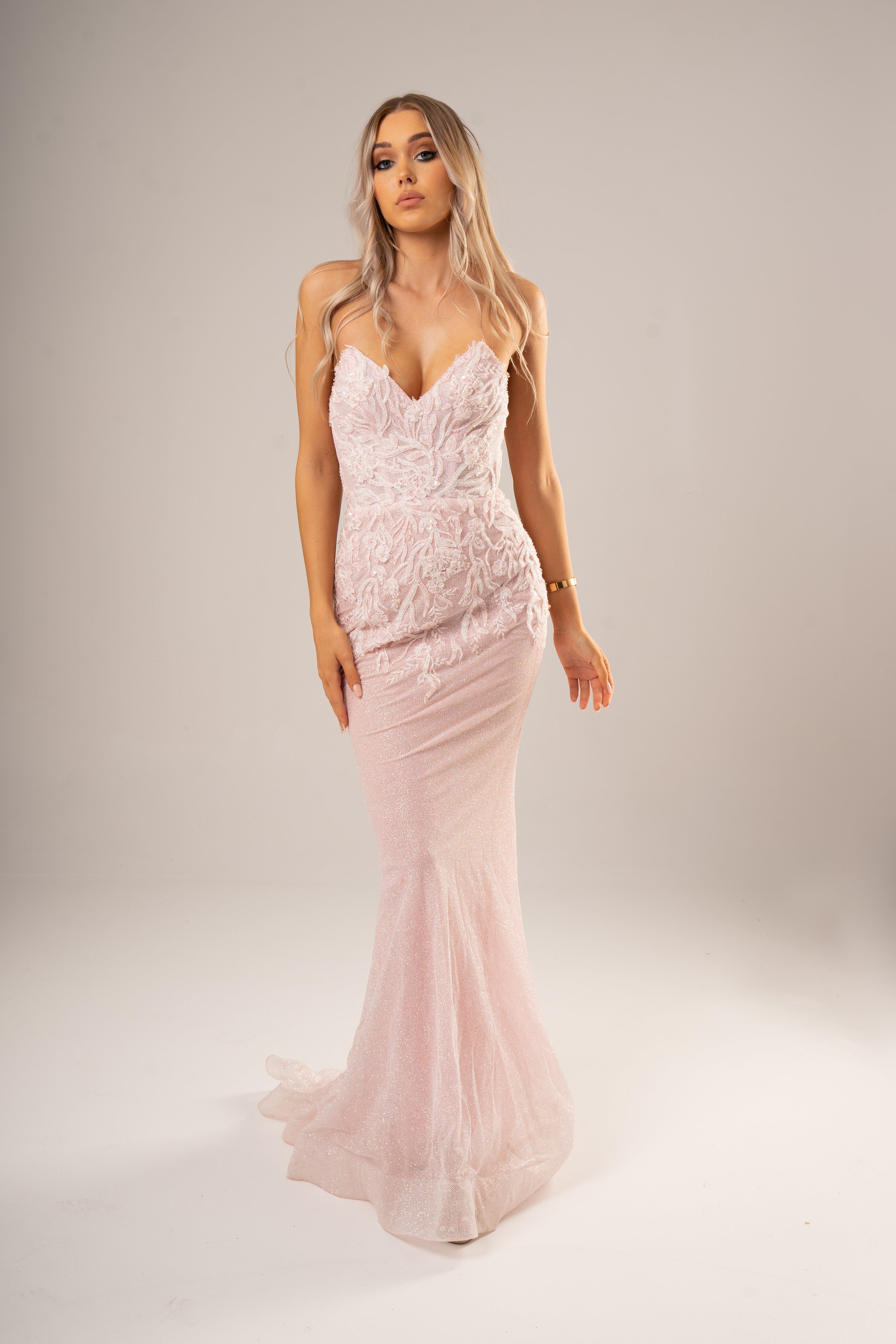 Sparkling pink dress with strapless deep V neckline and corset